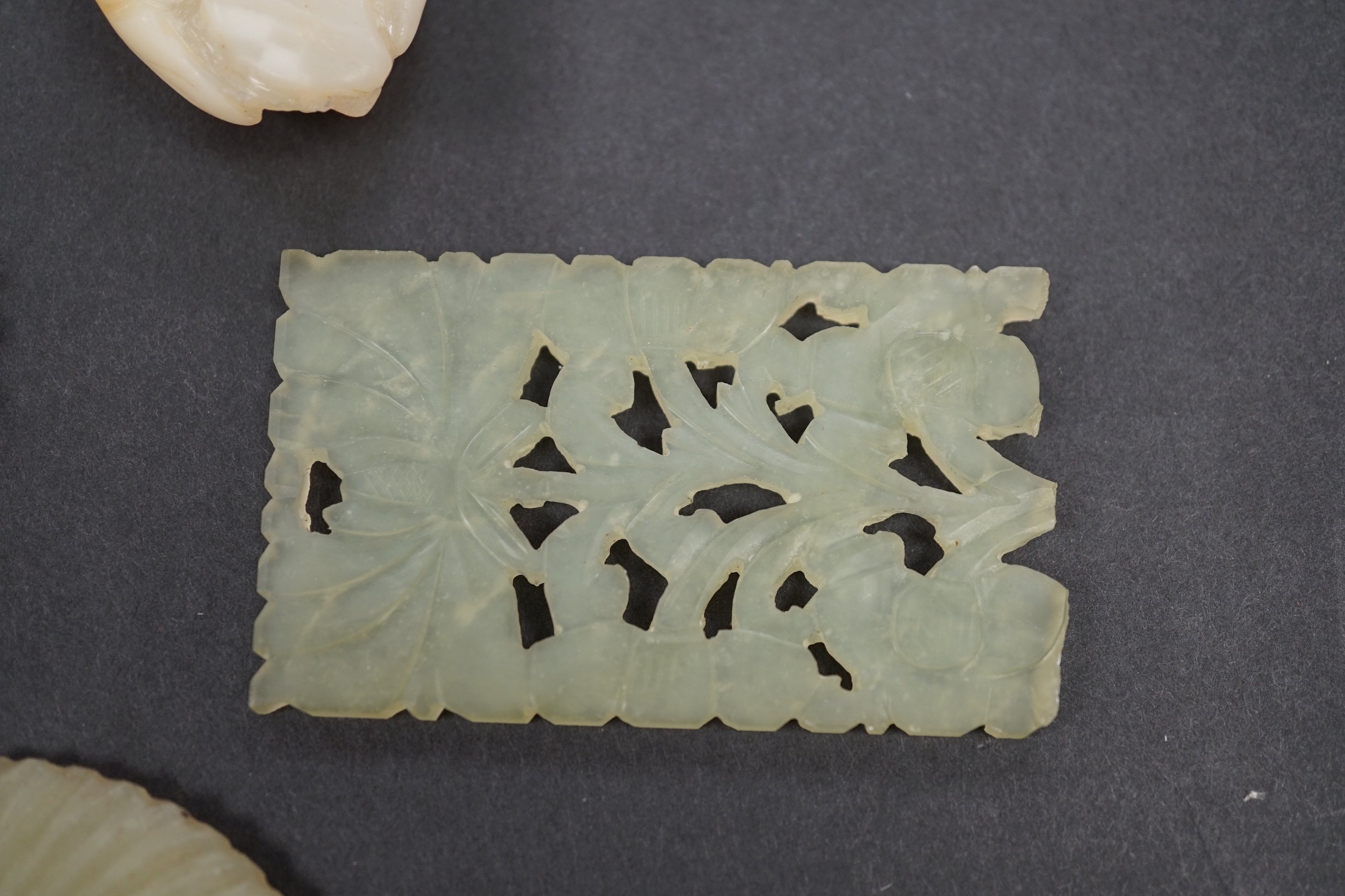 Four Chinese bowenite and jade carvings, the largest 7.8 cm